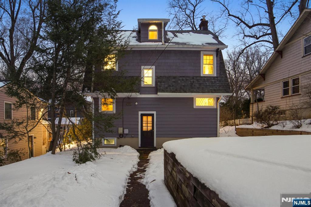 31 Nassau Road Montclair, NJ 07043 - Photo 27 of 33 a view of a house with a snow in the yard