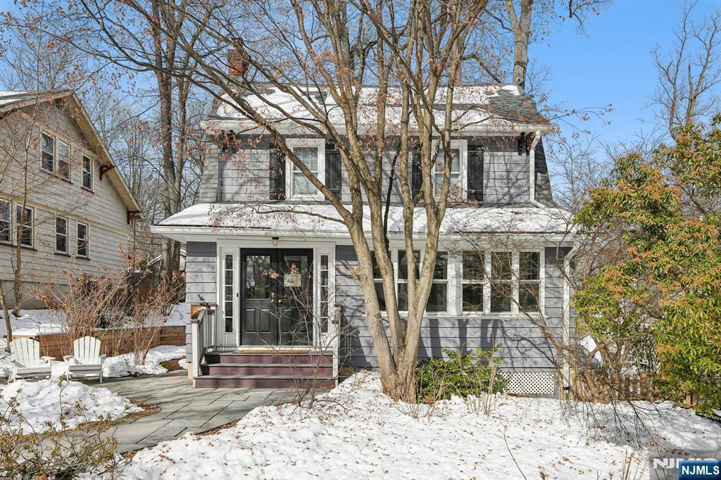 31 Nassau Road Montclair, NJ 07043 - Photo 3 of 33 a front view of a house with a yard and glass windows