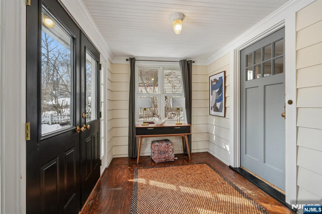 31 Nassau Road Montclair, NJ 07043 - Photo 4 of 33 a view of a bedroom with furniture and windows