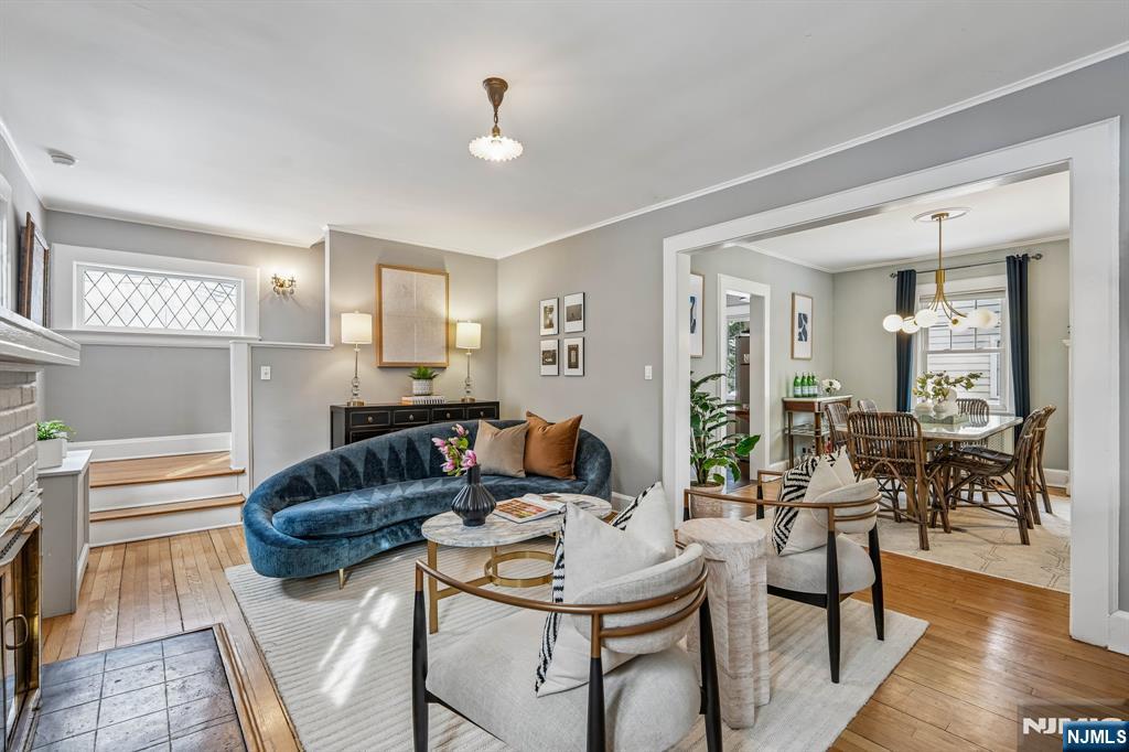 31 Nassau Road Montclair, NJ 07043 - Photo 7 of 33 a living room with furniture and a chandelier