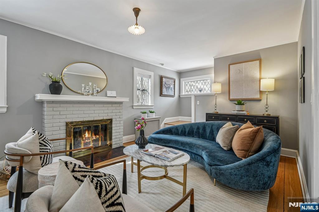 31 Nassau Road Montclair, NJ 07043 - Photo 8 of 33 a living room with furniture and a fireplace