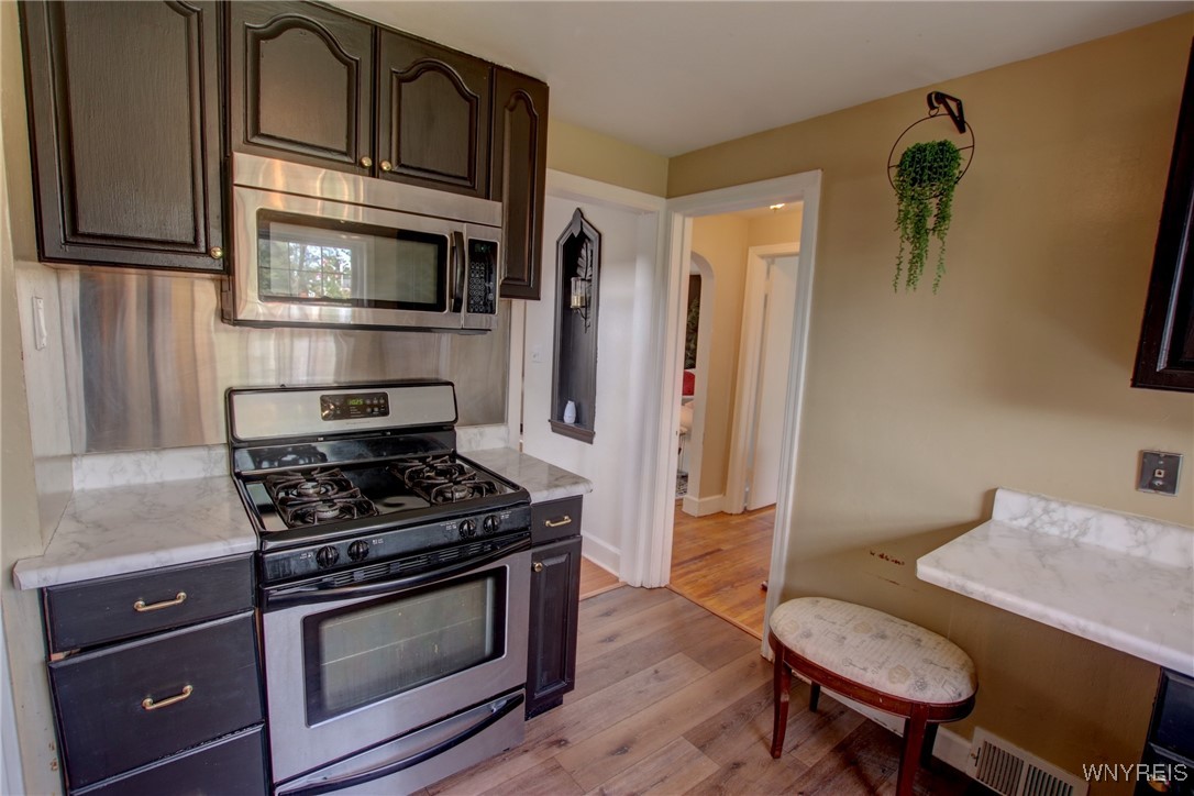 28 Cedar Road Cheektowaga, NY 14215 - Photo 14 of 43 More space on both sides of the stove and microwav