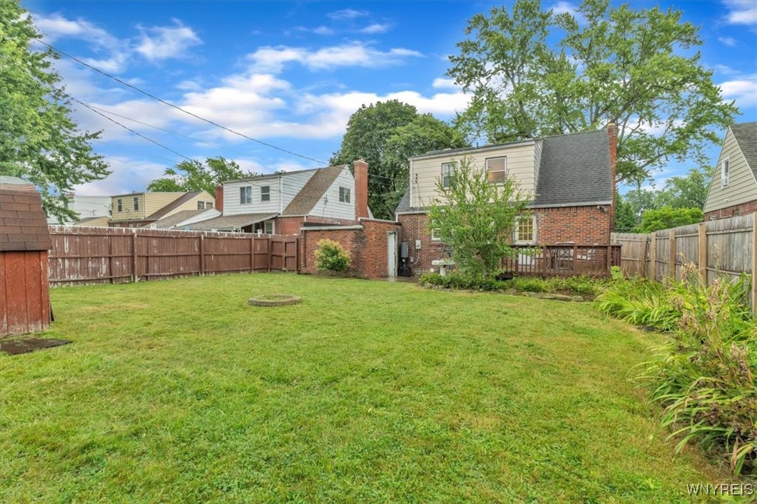 28 Cedar Road Cheektowaga, NY 14215 - Photo 31 of 43 There is more storage in the backyard shed