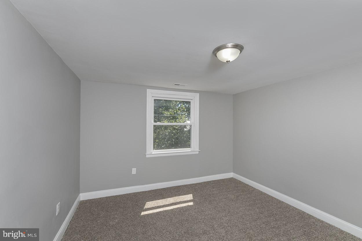 3924 Yolando Road Baltimore, MD 21218 - Photo 13 of 29 an empty room with a window