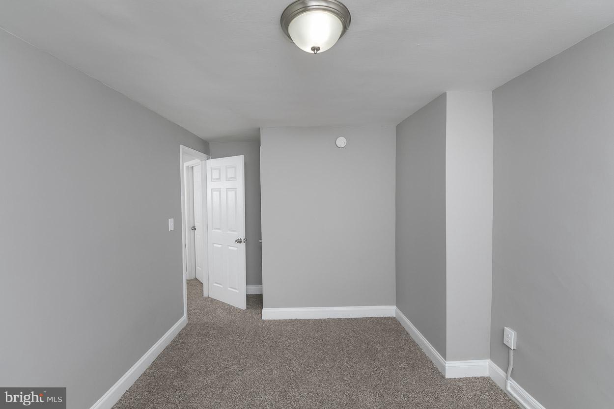 3924 Yolando Road Baltimore, MD 21218 - Photo 15 of 29 a view of an empty room with a window