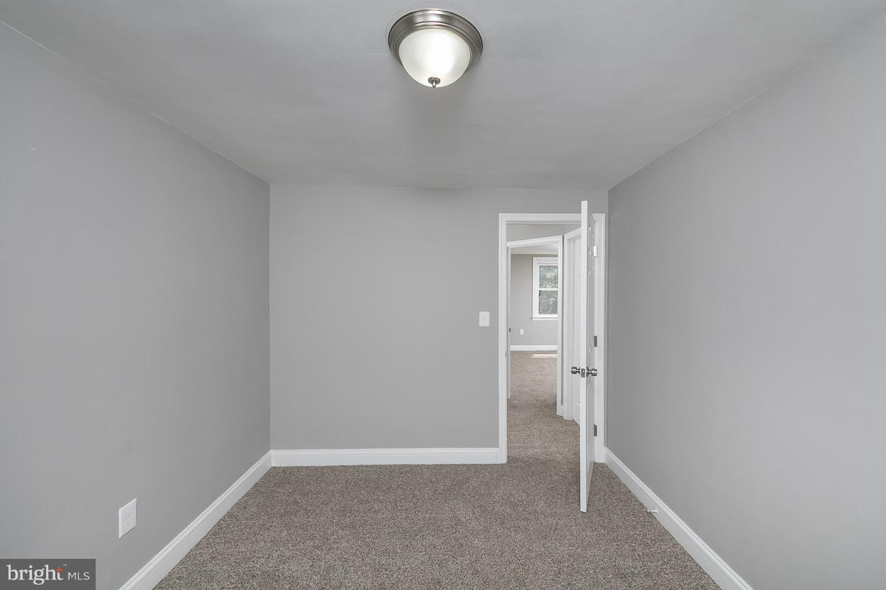 3924 Yolando Road Baltimore, MD 21218 - Photo 18 of 29 a view of an empty room with a window