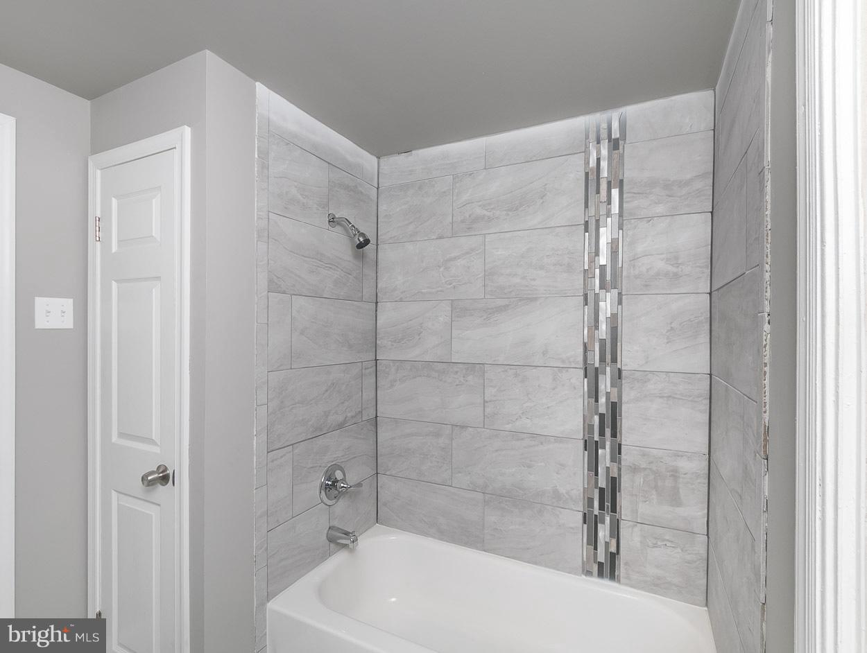 3924 Yolando Road Baltimore, MD 21218 - Photo 20 of 29 a bathroom with a bathtub and shower