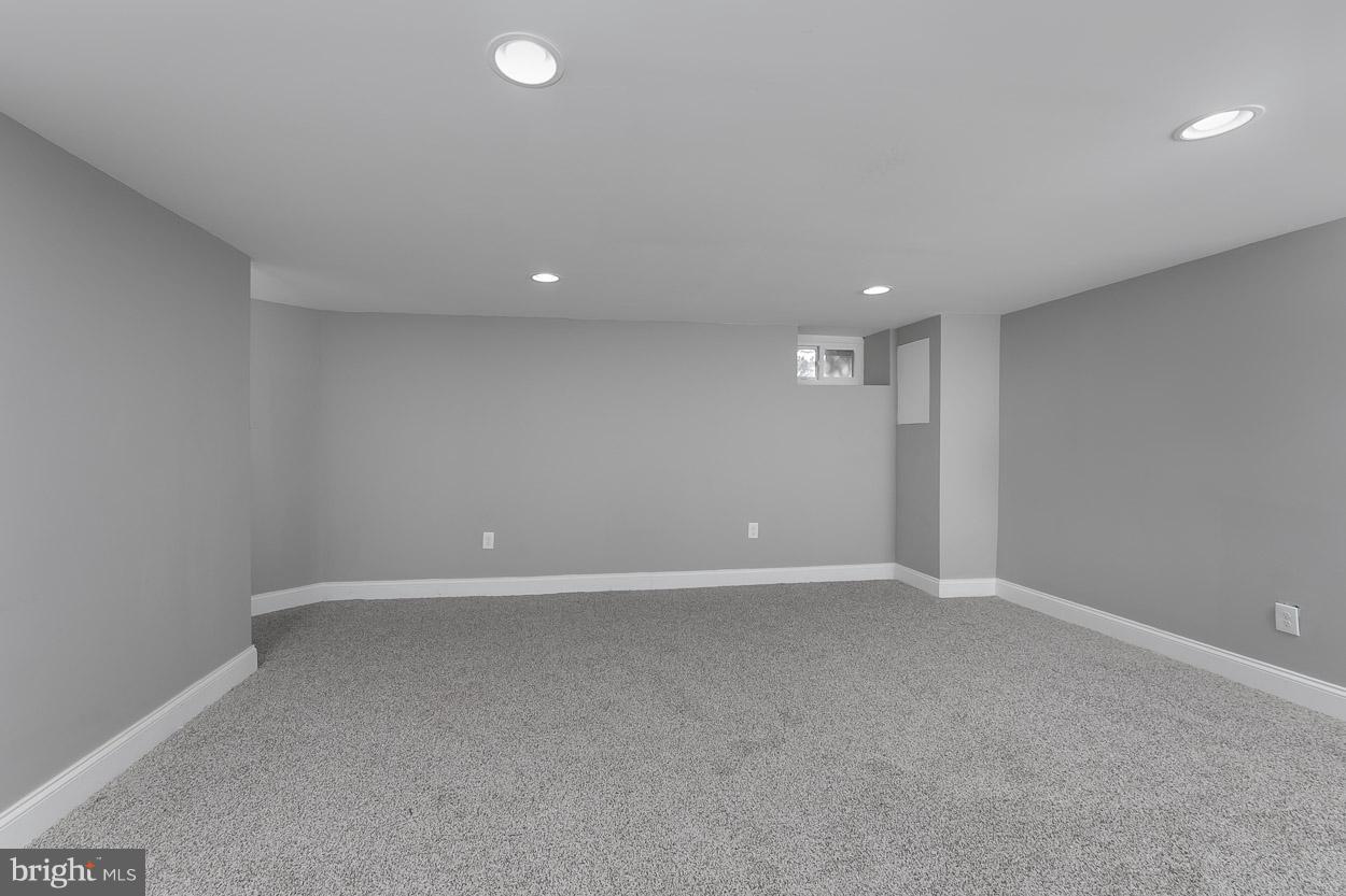 3924 Yolando Road Baltimore, MD 21218 - Photo 23 of 29 a view of an empty room with a window