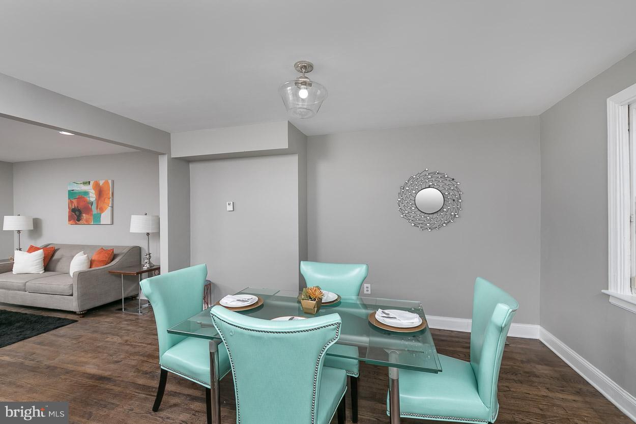 3924 Yolando Road Baltimore, MD 21218 - Photo 5 of 29 a view of a dining room with furniture and wooden floor