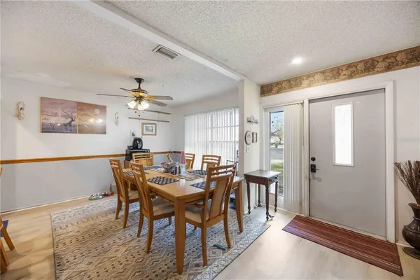 a view of a dining room with furniture