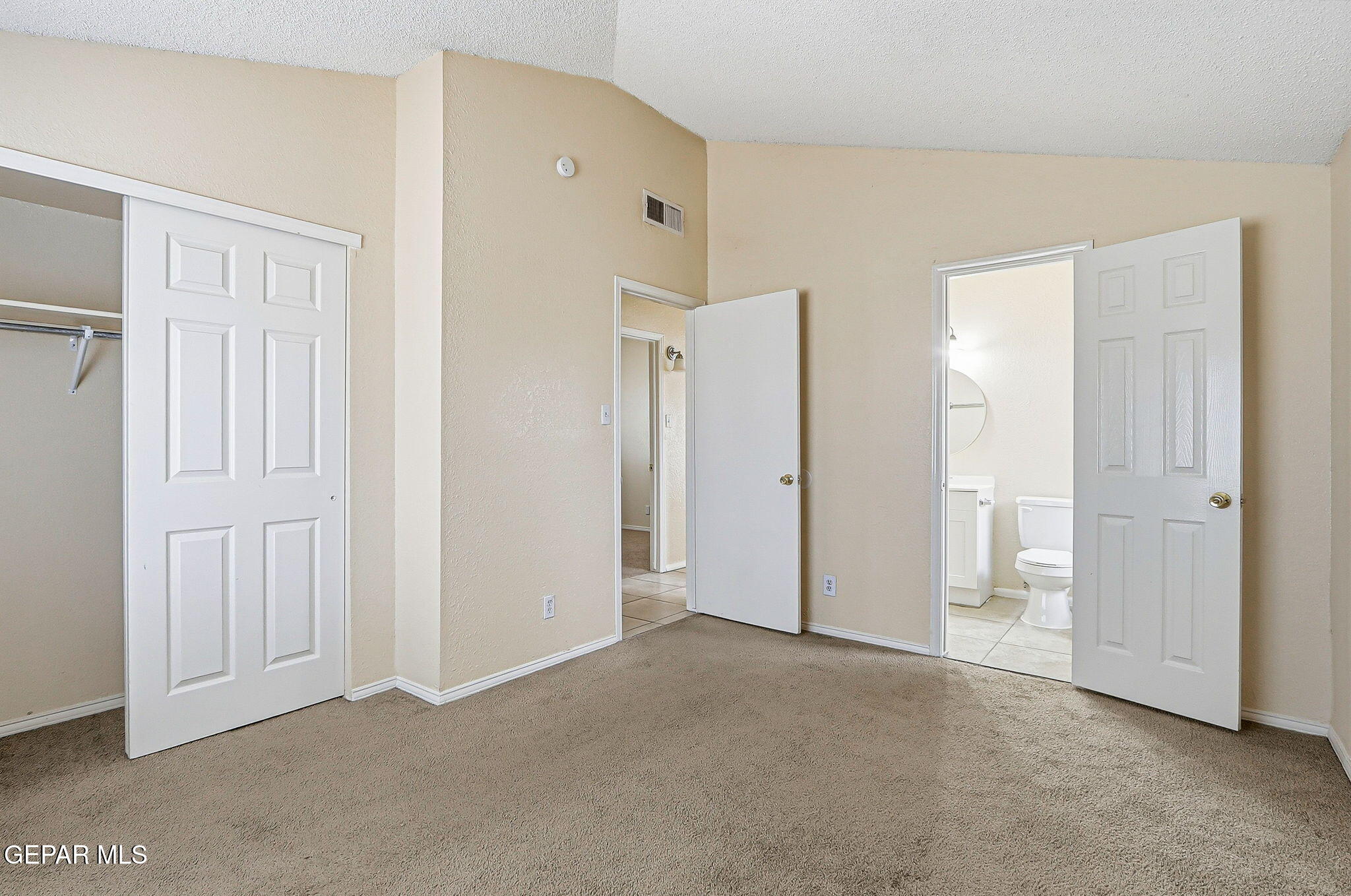 10801 Rhyolite Drive El Paso, TX 79924 - Photo 11 of 23 a view of an empty room with closet area