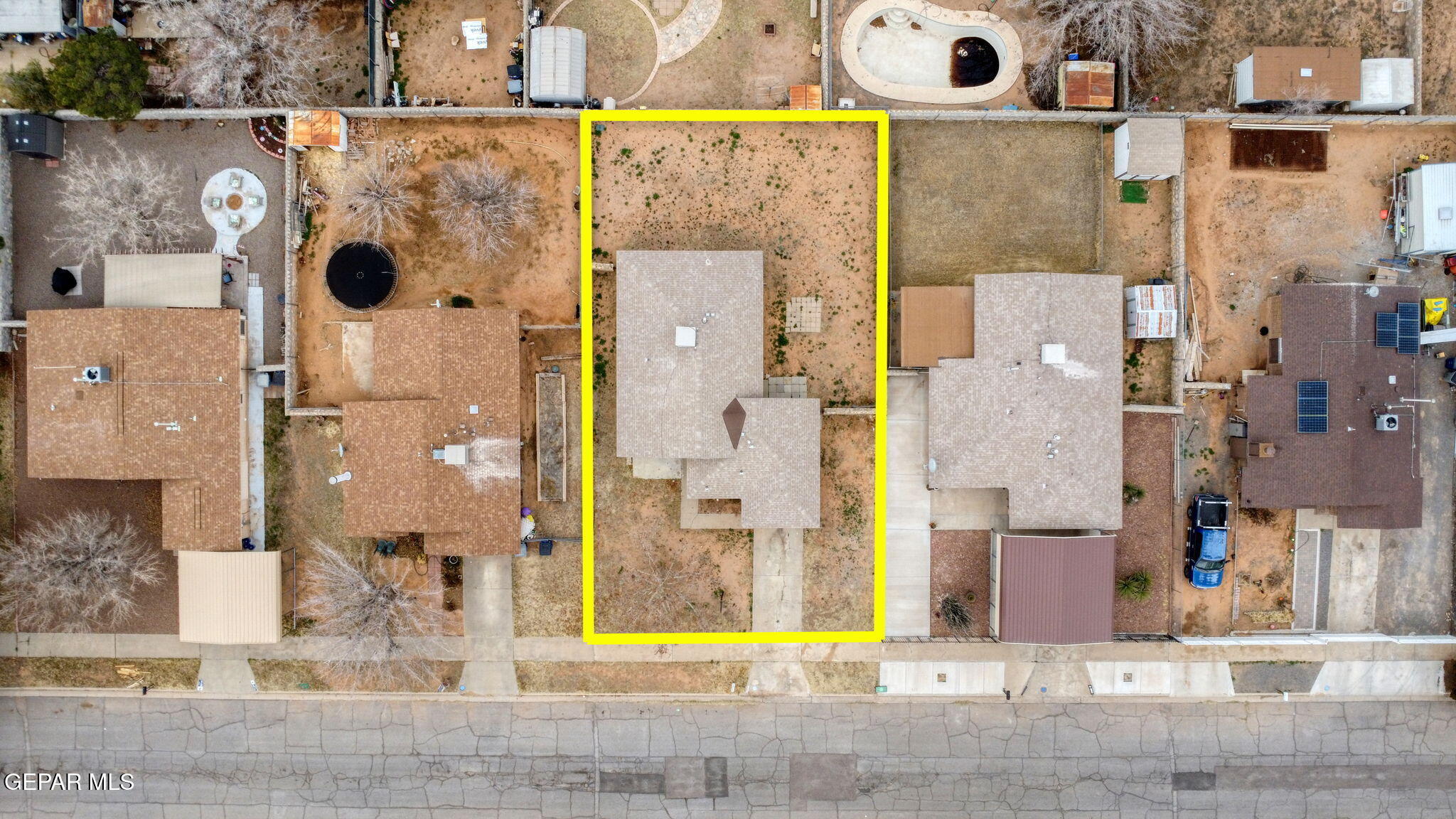 10801 Rhyolite Drive El Paso, TX 79924 - Photo 22 of 23 an aerial view of residential house with a swimming pool