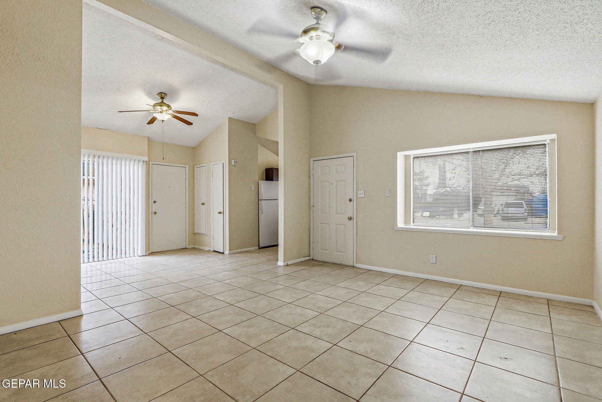 10801 Rhyolite Drive El Paso, TX 79924 - Photo 5 of 23 a view of an empty room with a window
