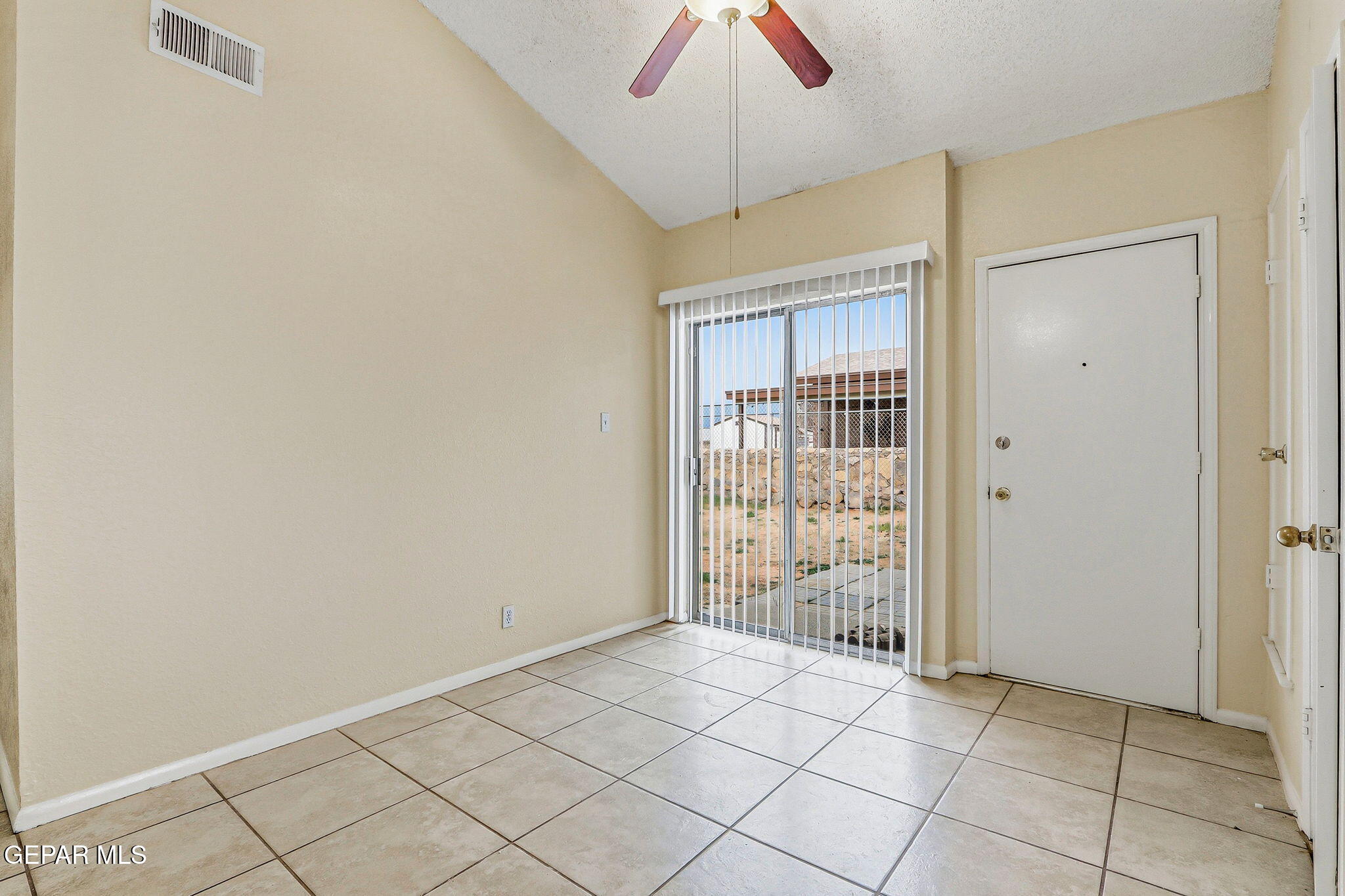 10801 Rhyolite Drive El Paso, TX 79924 - Photo 8 of 23 a view of an empty room and window