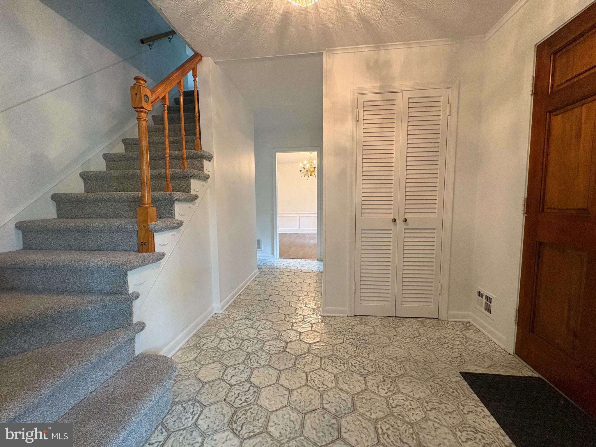3306 Whitesworth Road Phoenix, MD 21131 - Photo 4 of 31 a view of an entryway with wooden floor and door