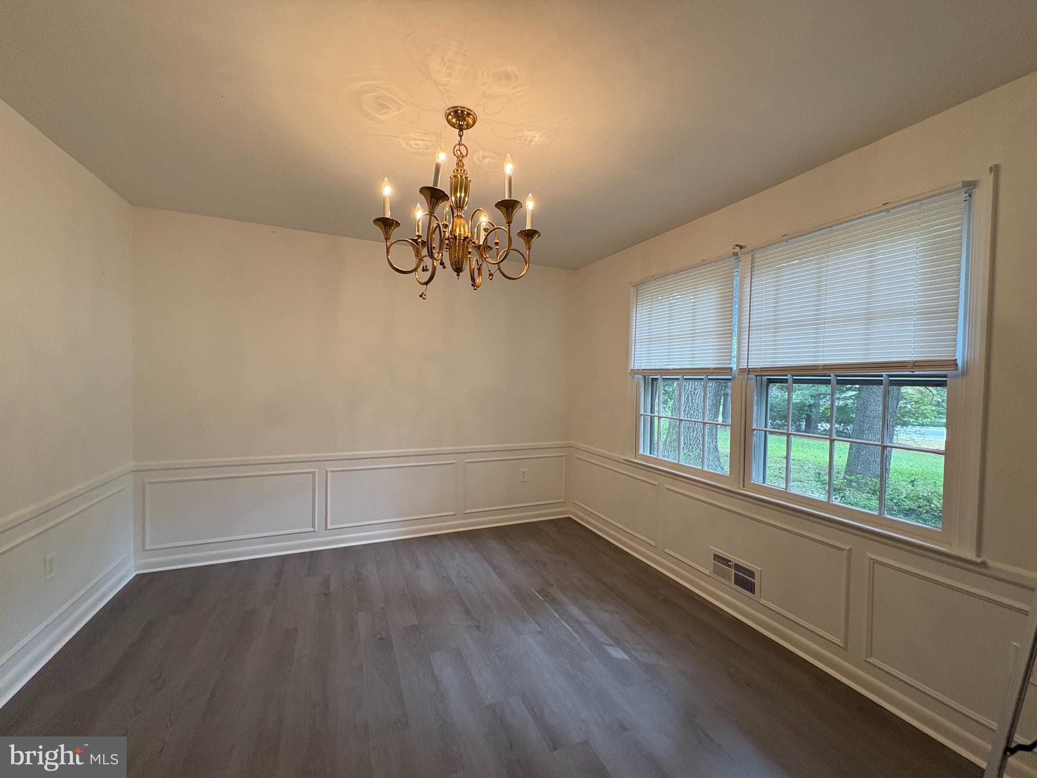 3306 Whitesworth Road Phoenix, MD 21131 - Photo 5 of 31 wooden floor in an empty room with a window