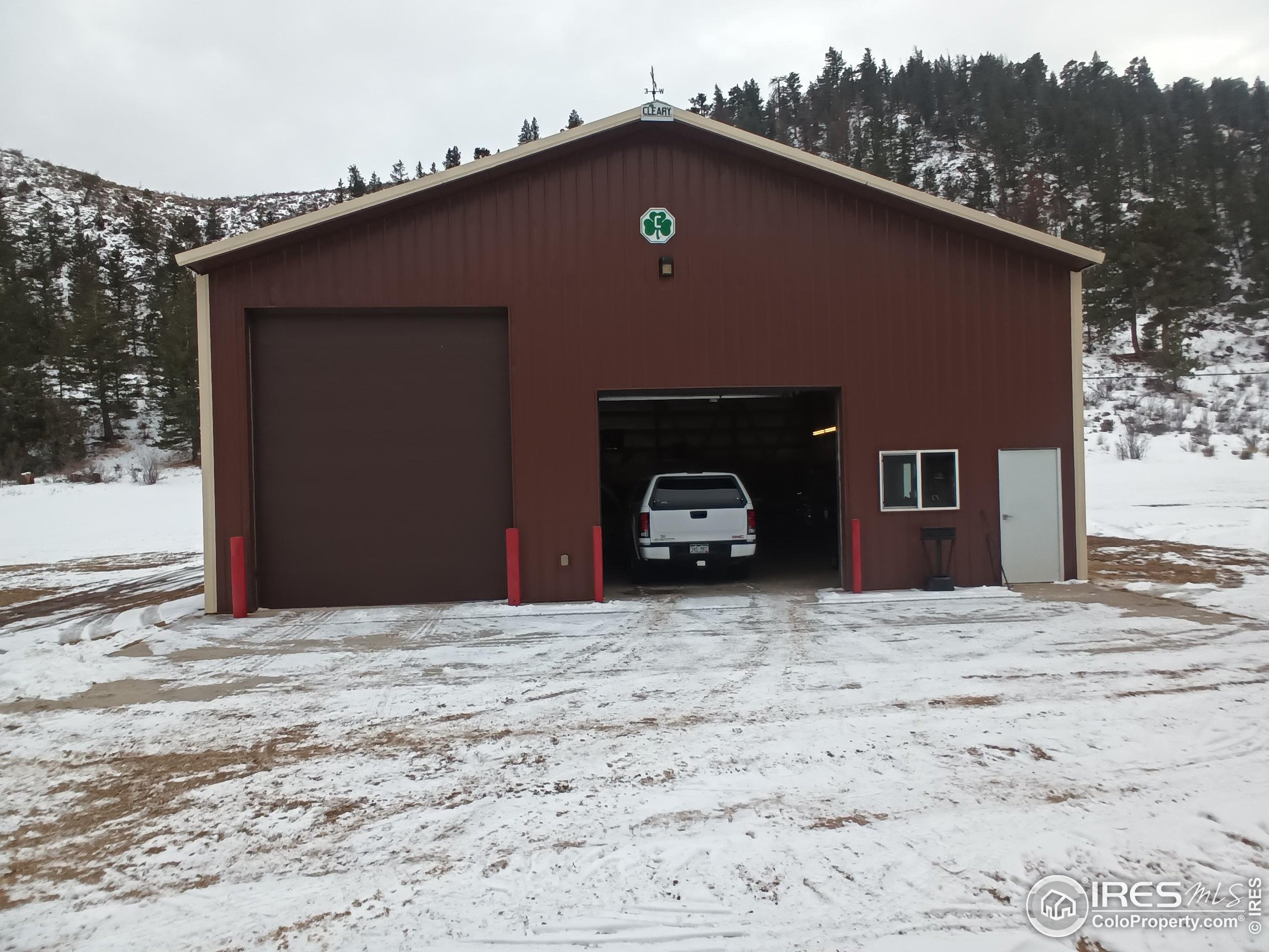 209 Crown Point Drive Bellvue, CO 80512 - Photo 4 of 16 a front view of a house