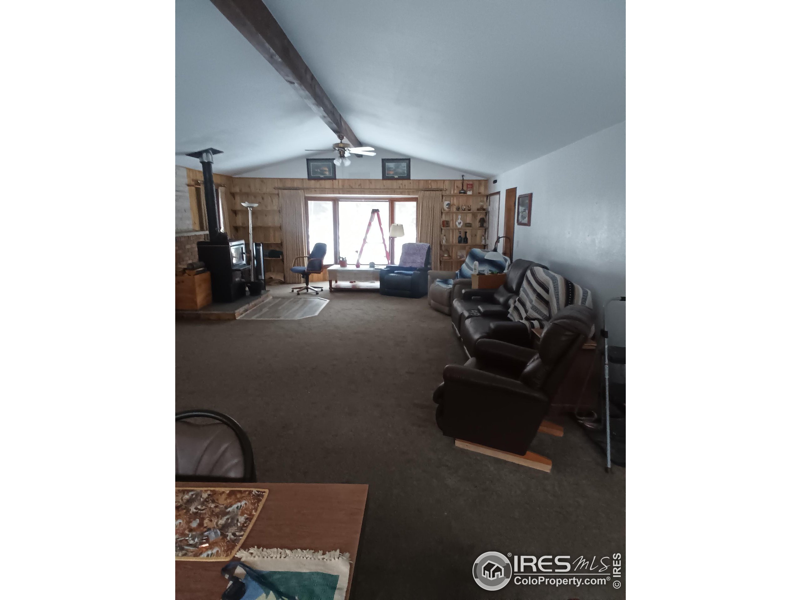 209 Crown Point Drive Bellvue, CO 80512 - Photo 9 of 16 a view of a room with gym equipment