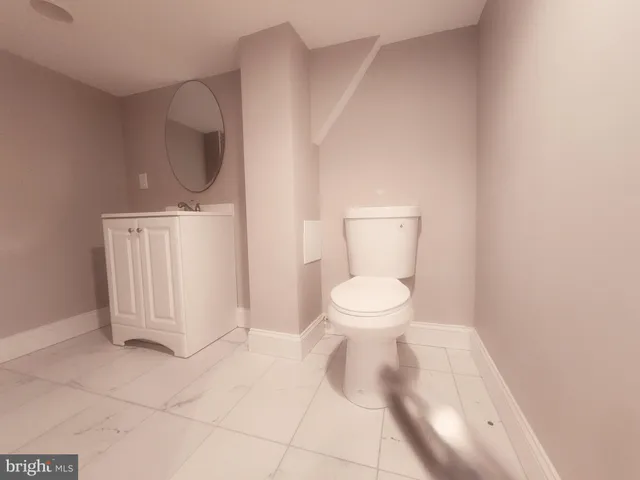 a bathroom with a toilet