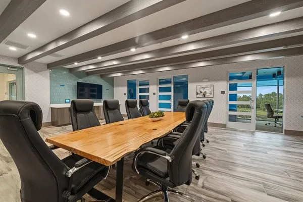 a view of a dining room with furniture