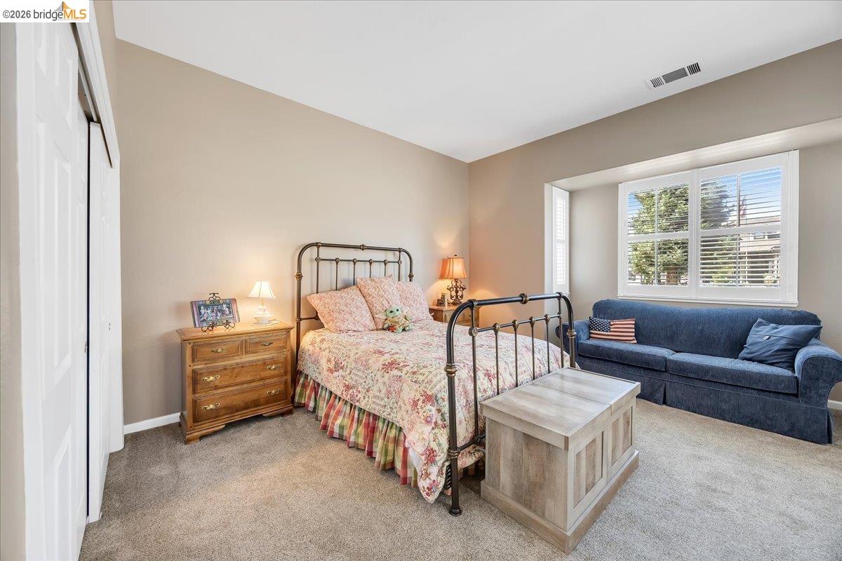 158 Rock Ridge Lane Copperopolis, CA 95228 - Photo 40 of 72 Carpeted room with neutral wall tones and a window featuring white horizontal blinds