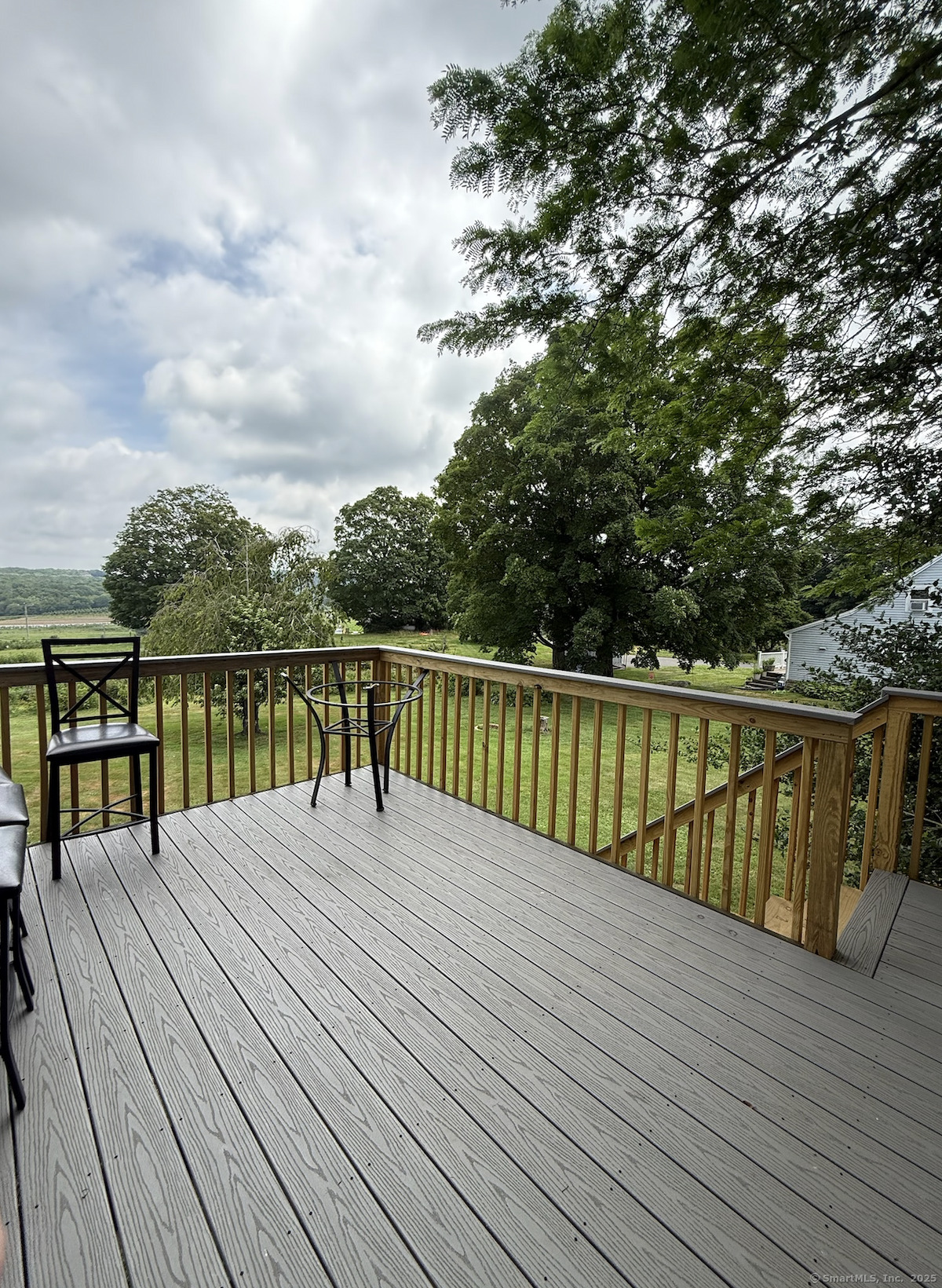 299 Matson Hill Road Glastonbury, CT 06073 - Photo 15 of 16 a balcony with trees in front of it
