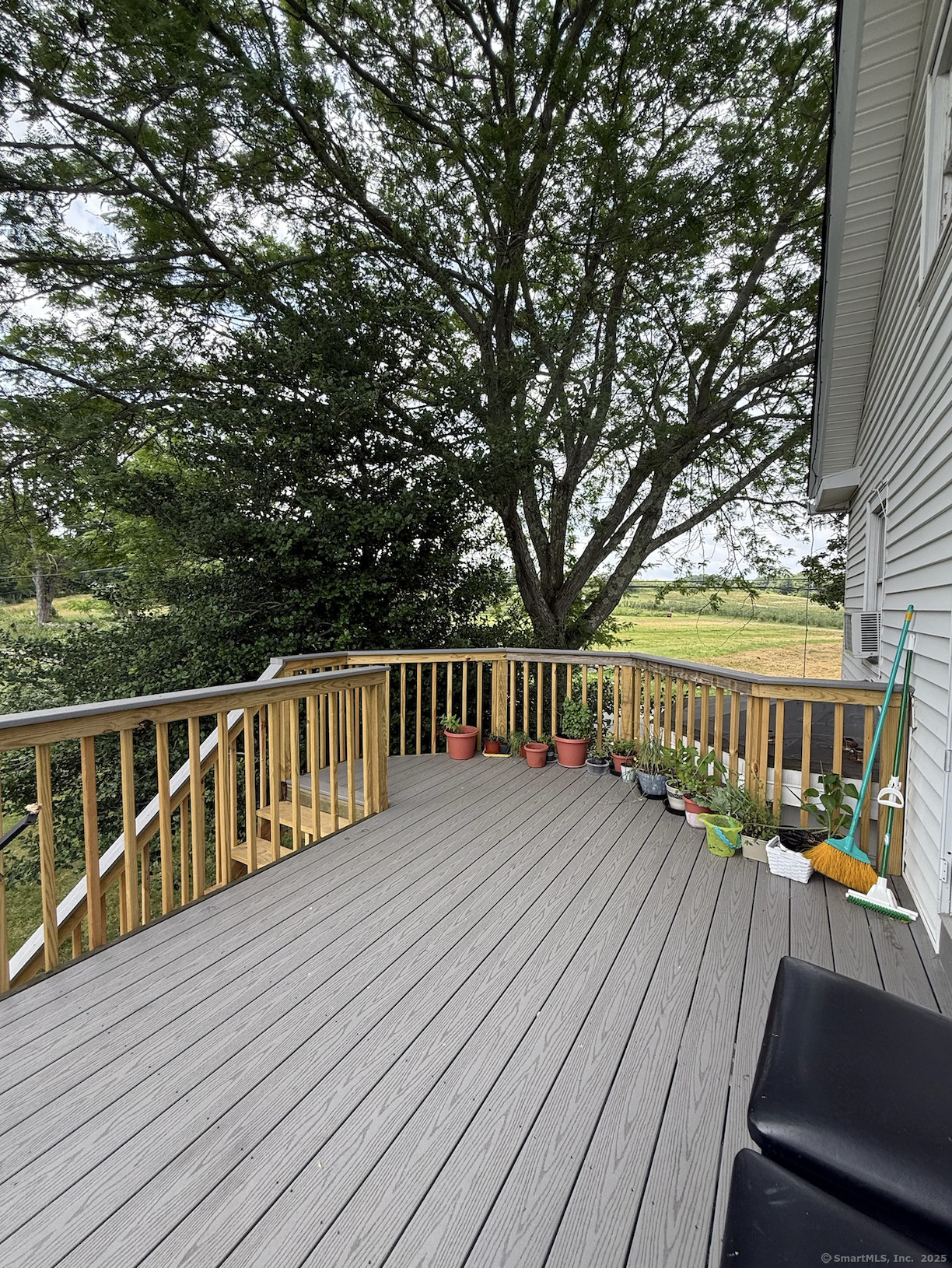 299 Matson Hill Road Glastonbury, CT 06073 - Photo 16 of 16 a view of balcony with wooden floor and fence