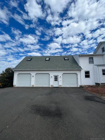 a view of backyard with a barn