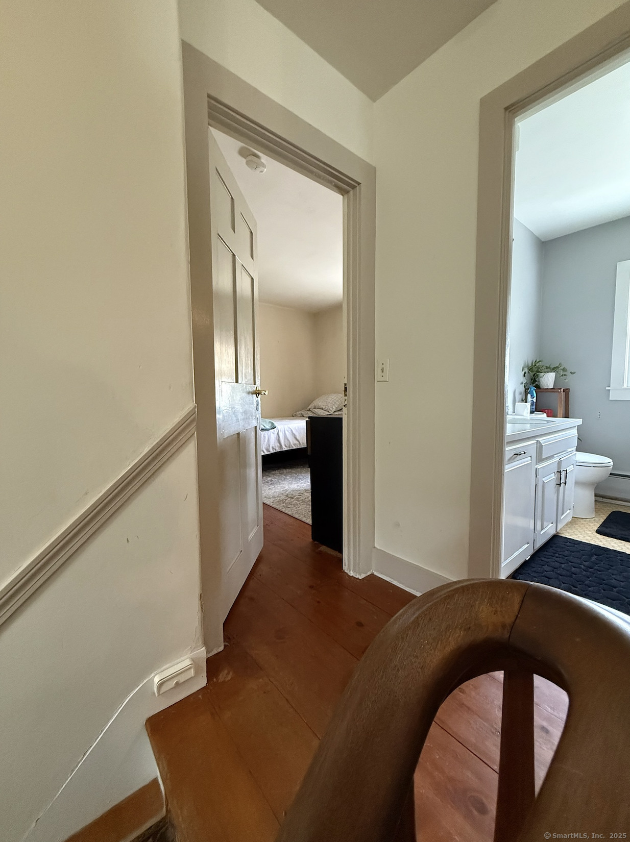 299 Matson Hill Road Glastonbury, CT 06073 - Photo 5 of 16 a bedroom with a bed and mirror