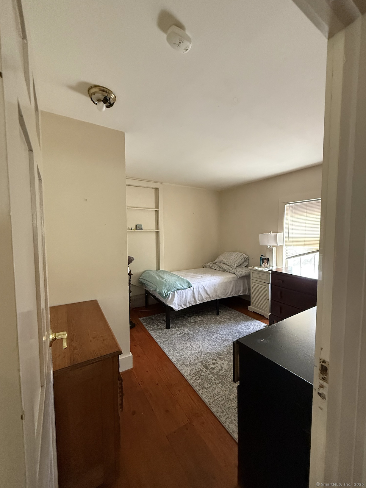 299 Matson Hill Road Glastonbury, CT 06073 - Photo 6 of 16 a bedroom with bed and window