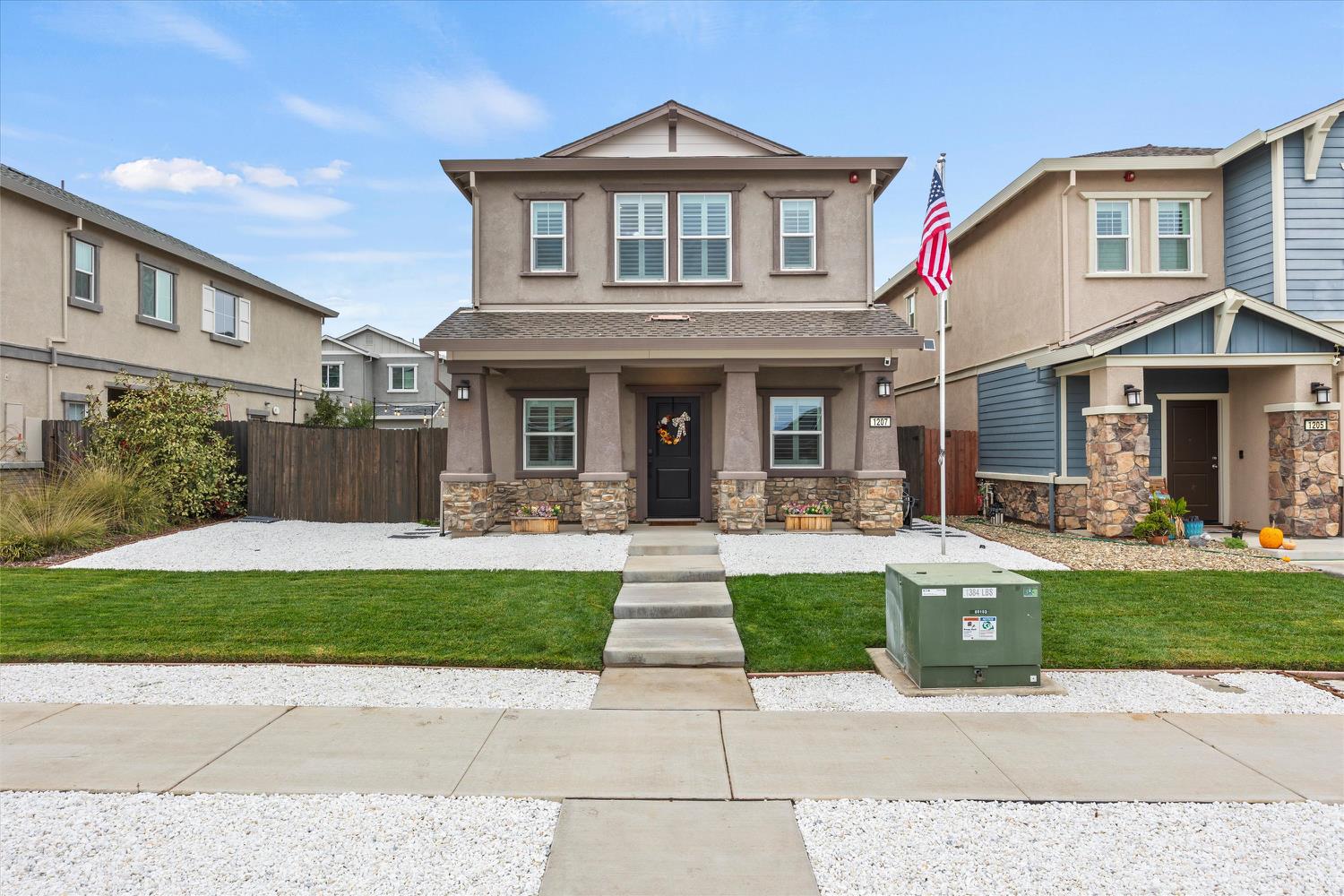 1207 Rojo Street Winters, CA 95694 - Photo 1 of 1 a front view of a house with a yard