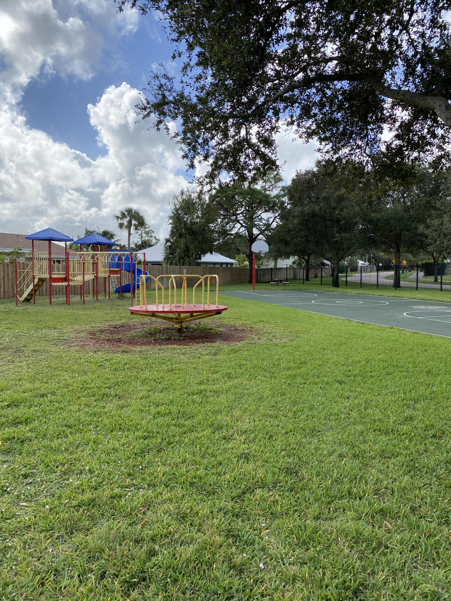 6183 Riverwalk Lane, Unit 3 Jupiter, FL 33458 - Photo 30 of 35 a view of a house with a big yard