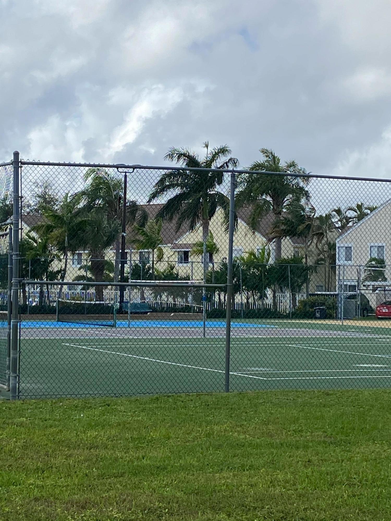 6183 Riverwalk Lane, Unit 3 Jupiter, FL 33458 - Photo 31 of 35 a view of a basketball court