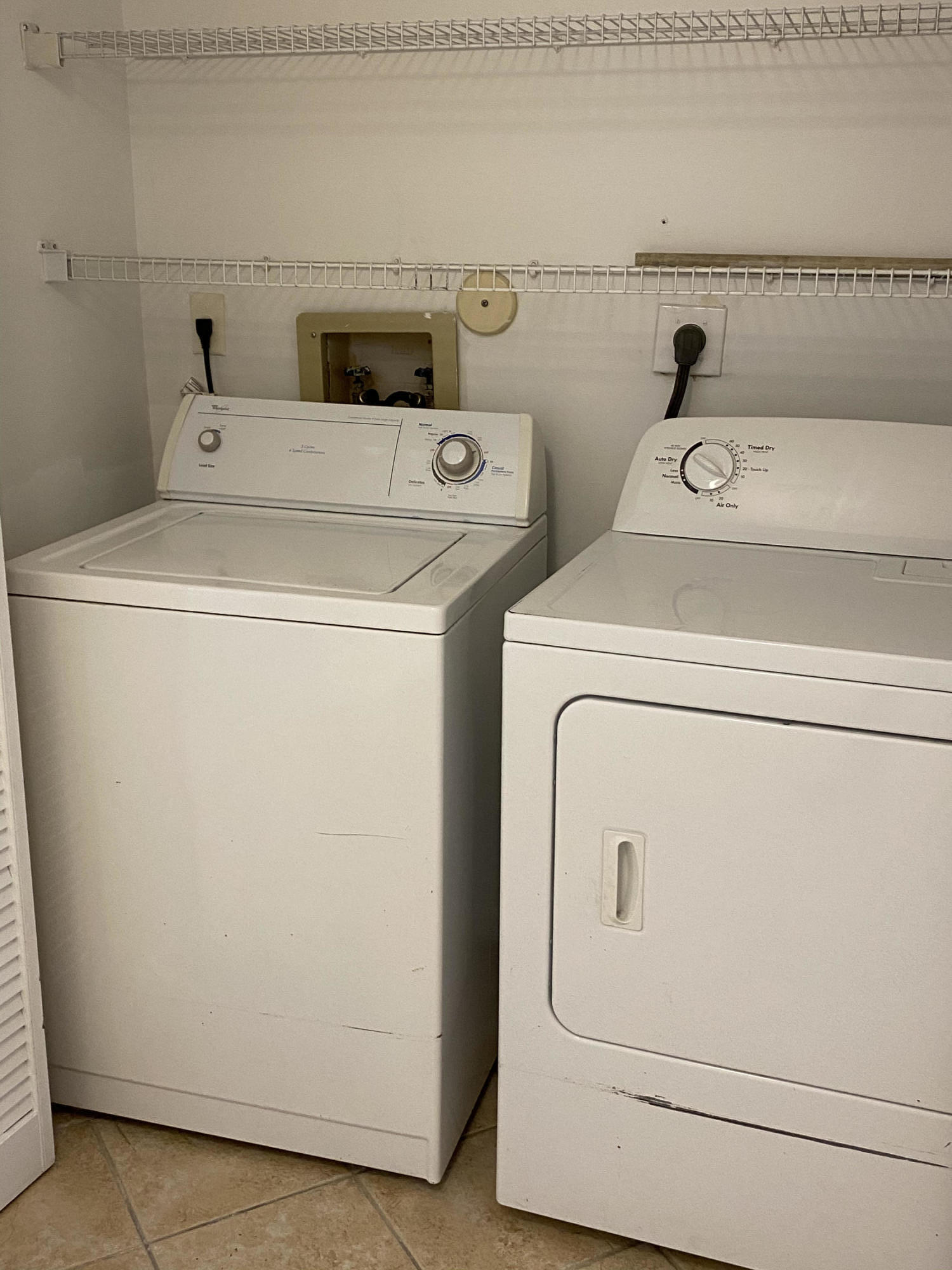 6183 Riverwalk Lane, Unit 3 Jupiter, FL 33458 - Photo 7 of 35 a utility room with dryer and washer