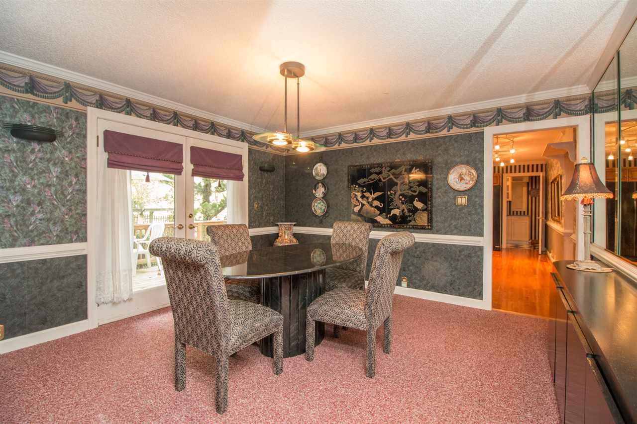 136 Bayleaf Drive Raleigh, NC 27615 - Photo 8 of 23 Good size dining room with an entrance onto the deck. French Doors! Dining Room