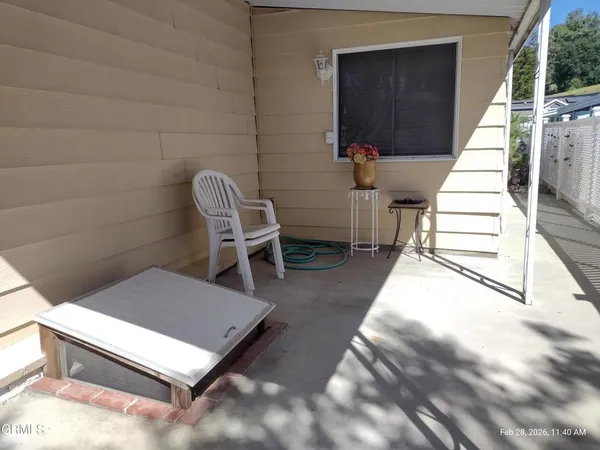 a front view of house with street
