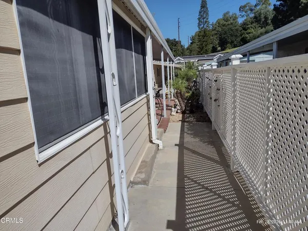 a room with furniture and pool table