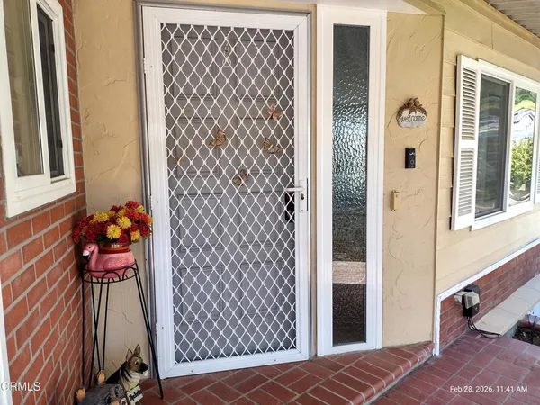 a backyard of a house with seating space