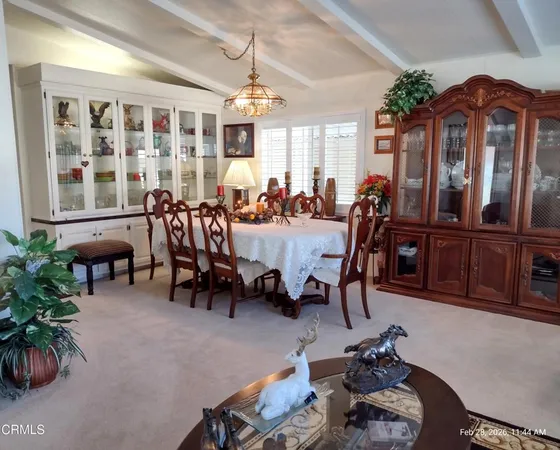 a view of a livingroom and dining room