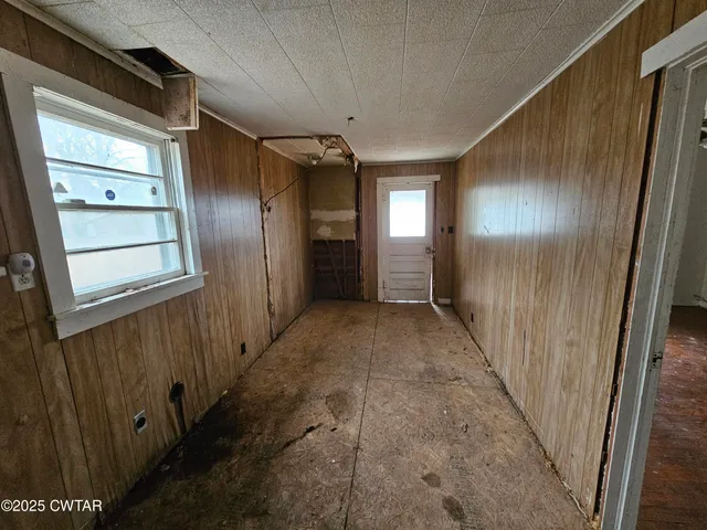 a view of hallway with stairs