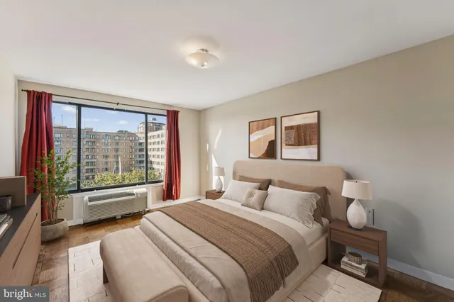 a bedroom with a bed and a couch