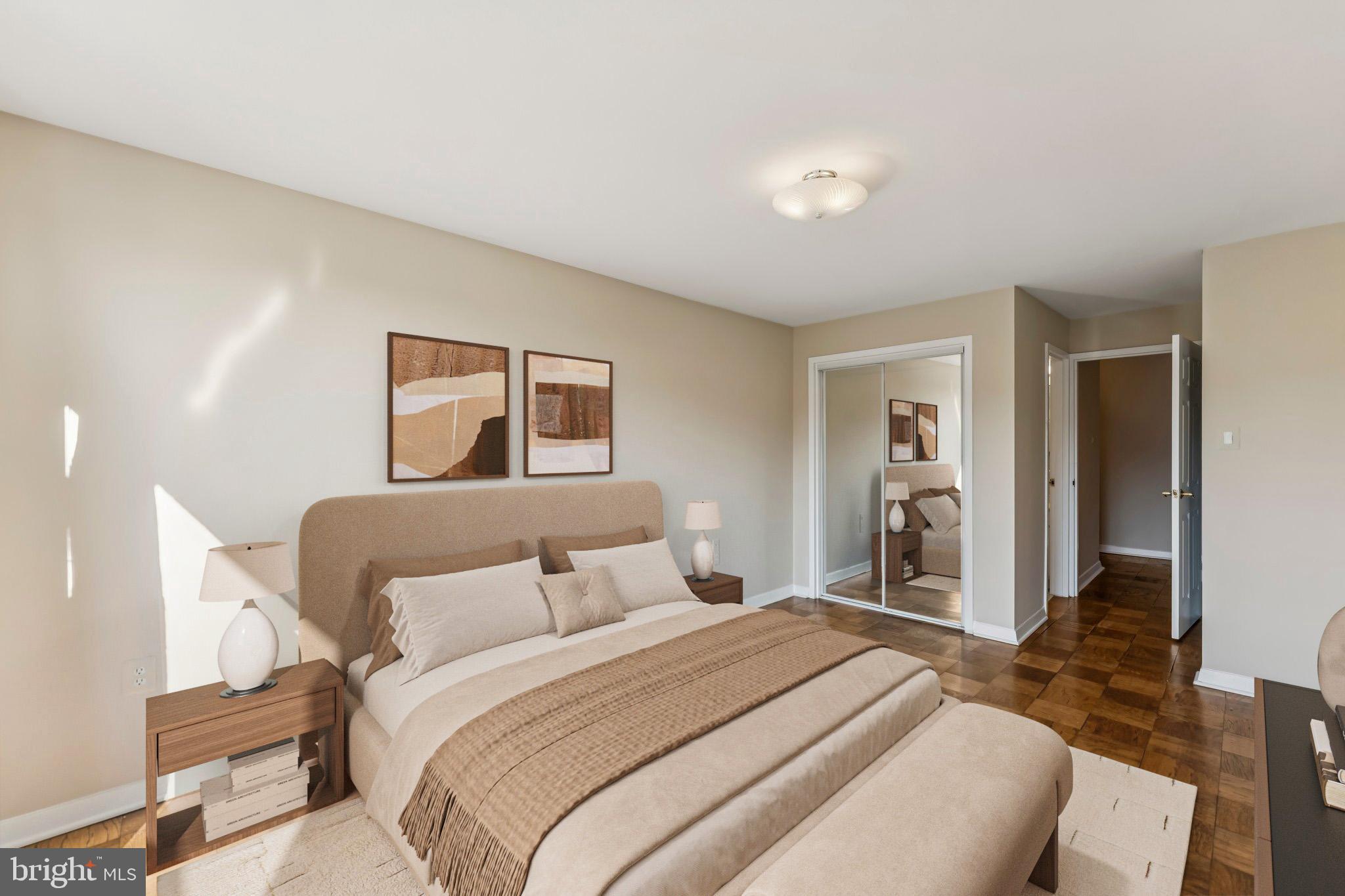2501 Calvert Street Northwest, Unit 701 Washington, DC 20008 - Photo 16 of 29 a bedroom with a bed and a couch