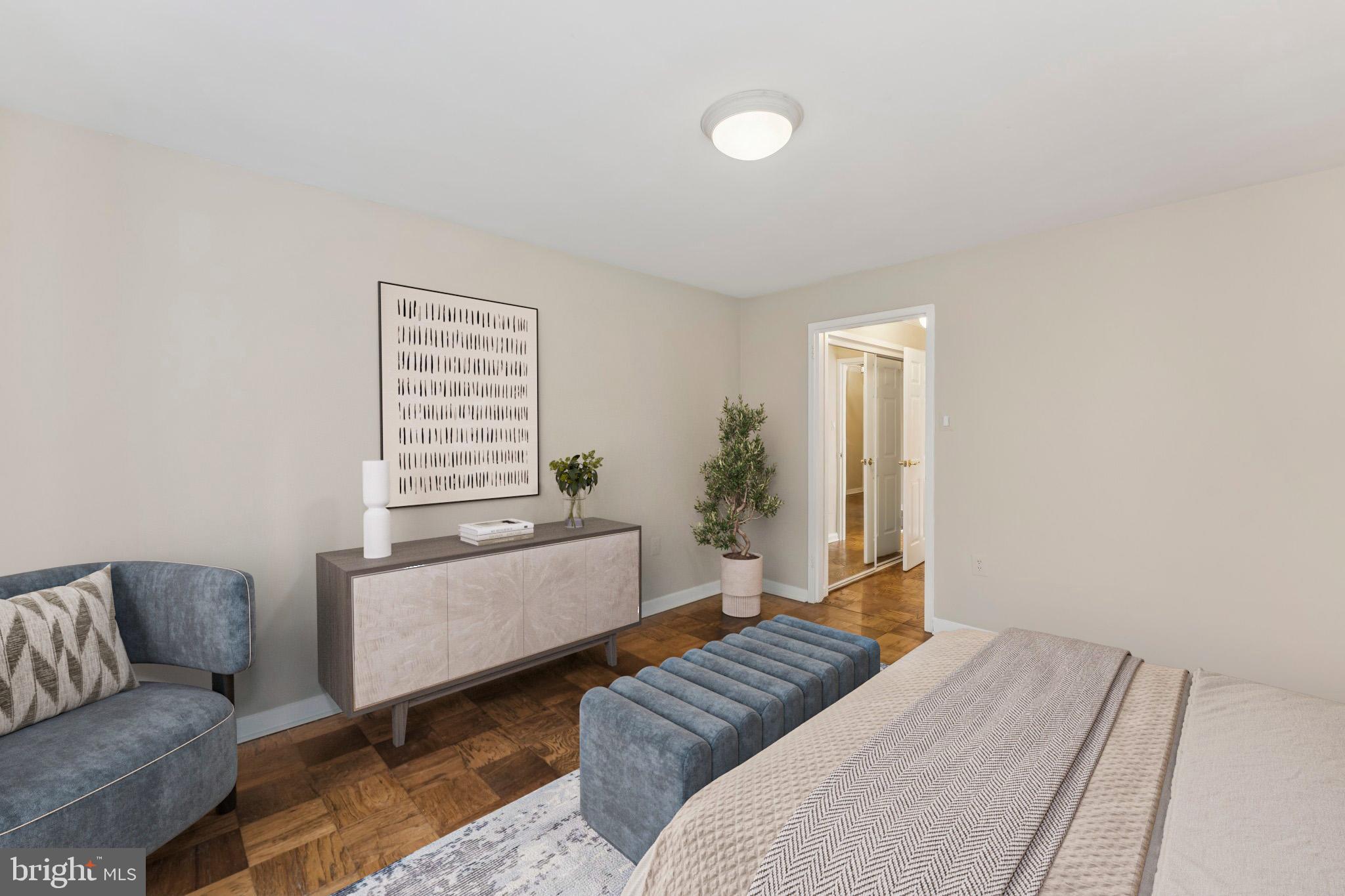 2501 Calvert Street Northwest, Unit 701 Washington, DC 20008 - Photo 19 of 29 a bedroom with a bed couch and a window