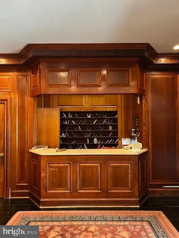 a kitchen with stainless steel appliances granite countertop a stove and a microwave oven