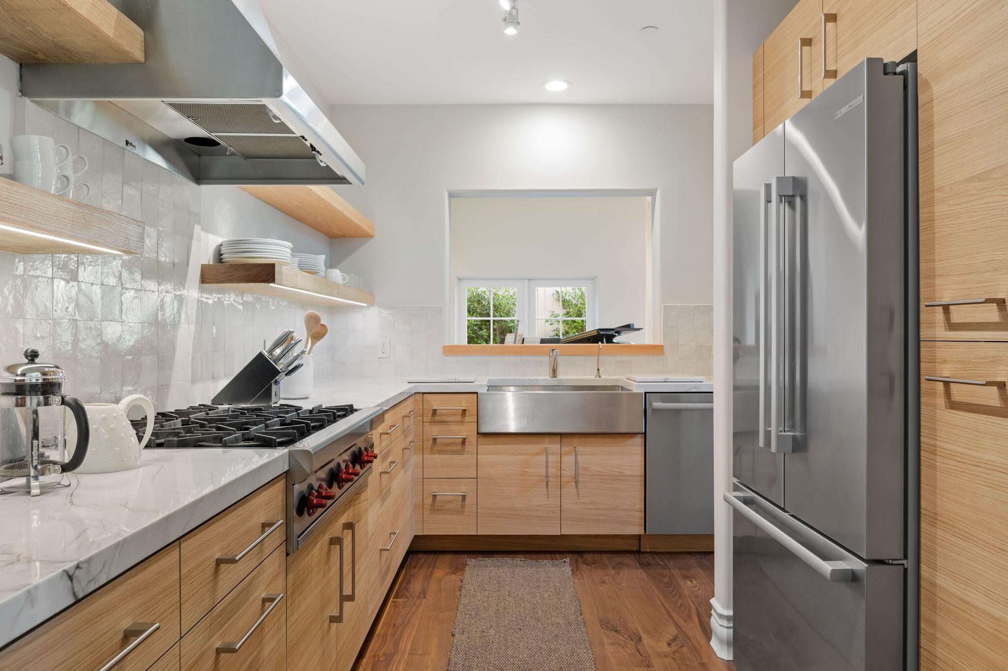 71 Olive Mill Road Montecito, CA 93108 - Photo 11 of 30 a kitchen with stainless steel appliances granite countertop a refrigerator and a stove