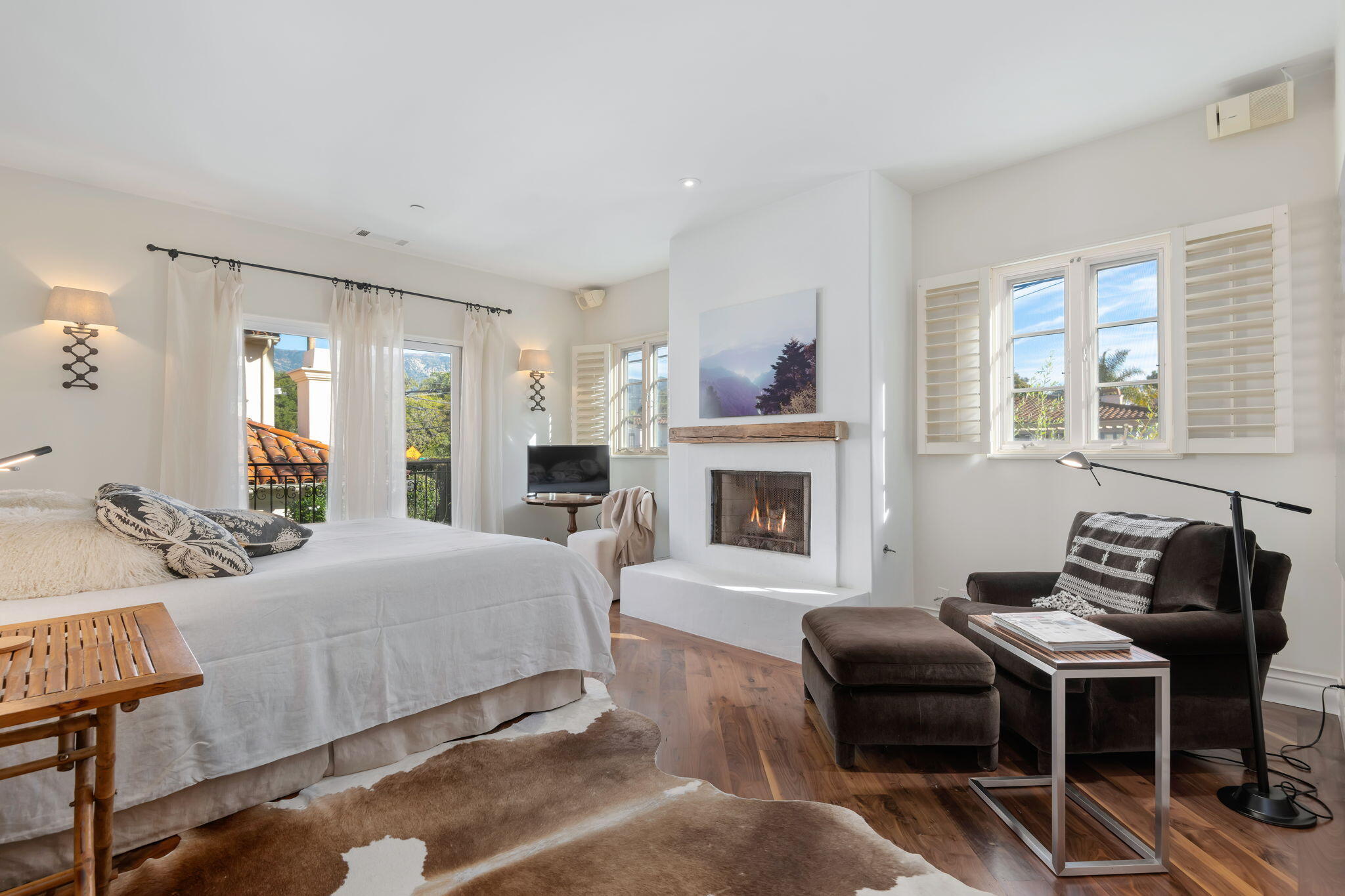 71 Olive Mill Road Montecito, CA 93108 - Photo 20 of 30 a bedroom with a bed and a fireplace