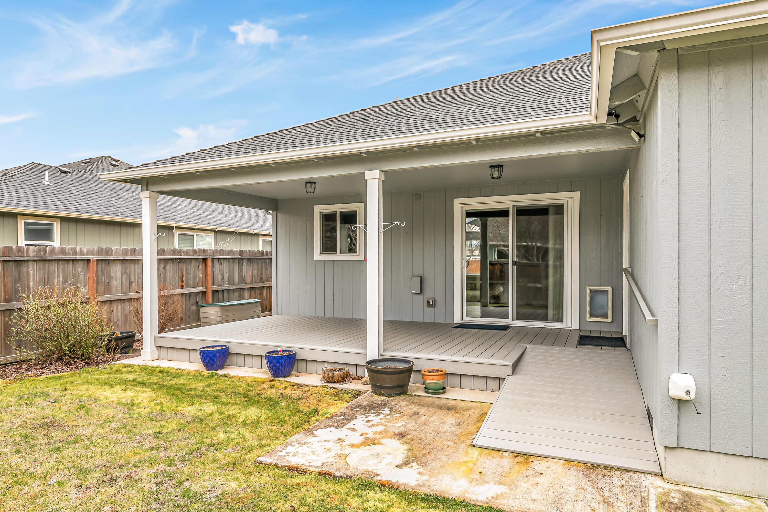 3288 Grant Road Central Point, OR 97502 - Photo 23 of 30 Enjoy covered back patio for enjoying warm Rogue Valley evenings.