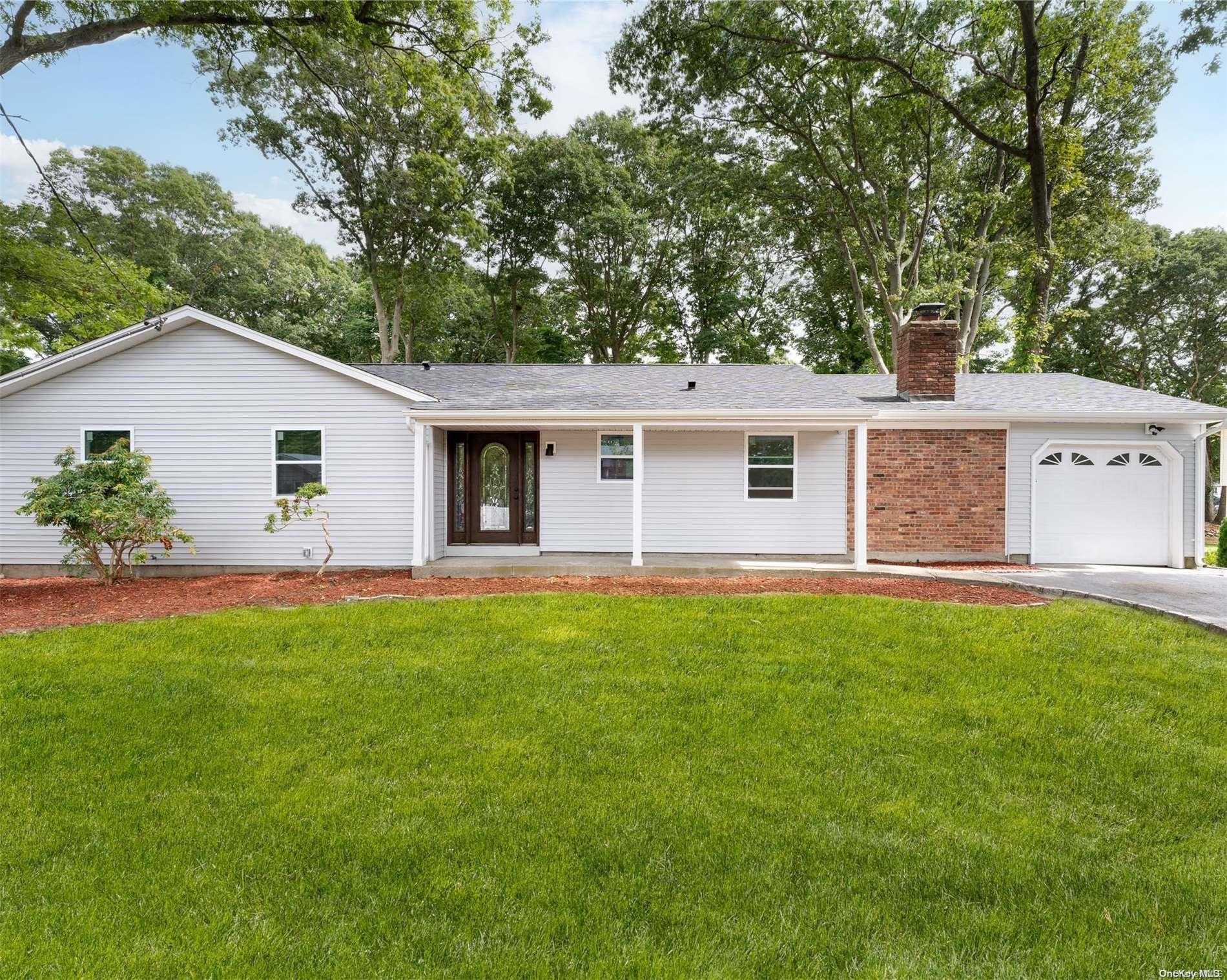 84 Mahogany Road Rocky Point, NY 11778 - Photo 1 of 1 a view of a house with backyard