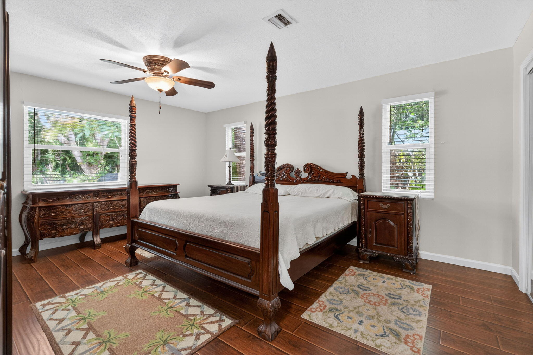 17391 Alexander Run Jupiter, FL 33478 - Photo 13 of 55 a bedroom with a bed dresser and a window