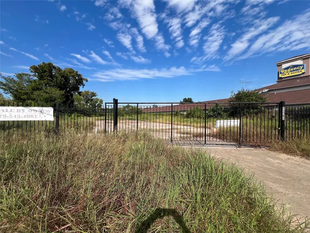 a view of a lake with a big yard